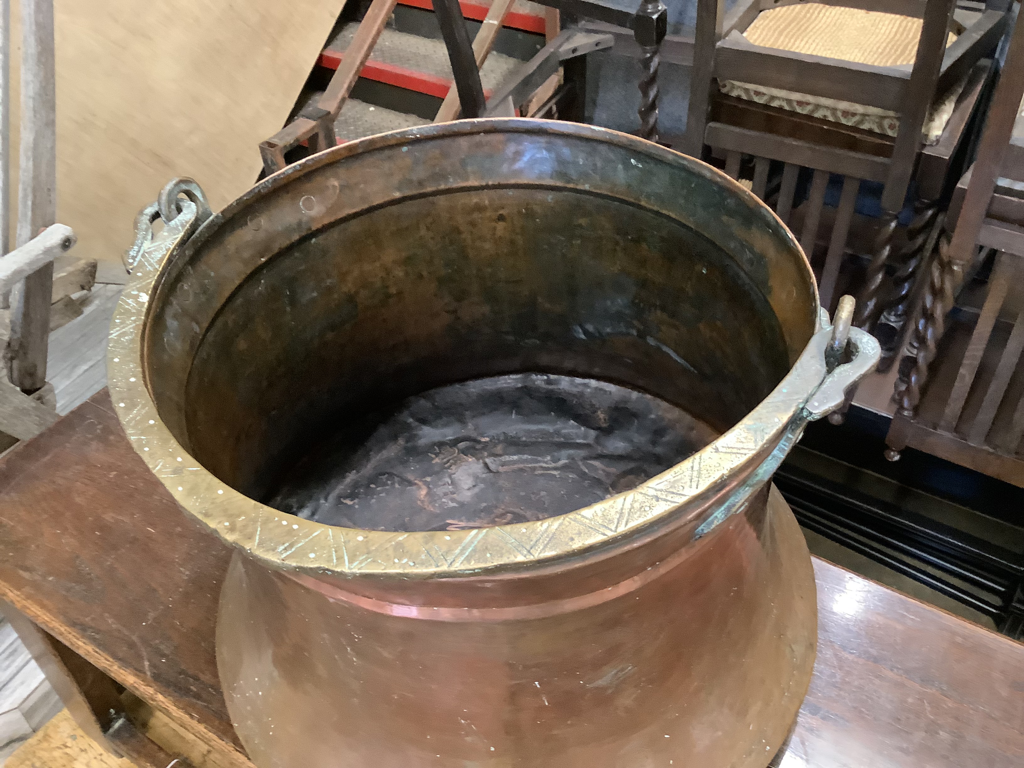 A large Eastern copper and brass cauldron, diameter 46cm, height 38cm
